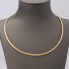 Collier rigide en or bicolore 18k d'occasion