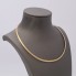 Collier rigide en or bicolore 18k d'occasion
