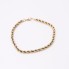 Bracelet cordon en or massif 18 carats d'occasion