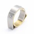 Bague CARL DAU GEOMETRY en or et acier. Neuve