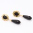 Pendientes de oro 18k con coral negro de segunda mano
