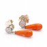 Boucles d\'oreilles en or blanc et corail. Neuves