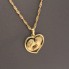 Cadena singapur amb penjoll enamorats d'or 18k