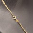 Cadena singapur amb penjoll enamorats d'or 18k