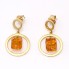 Boucles d'oreilles circulaires en or 18 carats avec citrine trotteuse