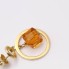 Boucles d'oreilles circulaires en or 18 carats avec citrine trotteuse