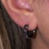 Boucles d'oreilles DAMIANI en or noir. Neuves