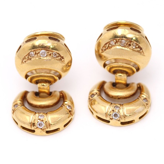 Boucles d'oreilles ajourées en or 18k...