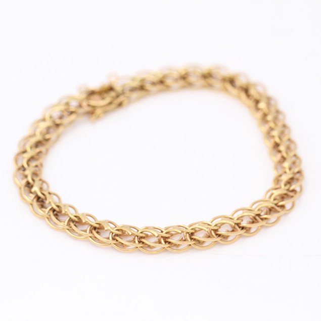 Bracelet entrelacé en or 18k d'occasion