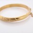 Brazalete labrado de oro 18k de segunda mano