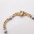 Bracelet alterné d'occasion en or 18k avec diamants