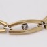 Bracelet à maillons ovales en or 18k avec zircons