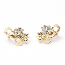 Boucles d\'oreilles FLEUR NOUVEAU en or et platine. Seconde main