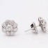 Boucles d'oreilles rosette en or 18k avec diamants seconde main