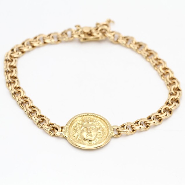 Bracelet bréguet avec médaille en or...