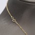 Collier fleurs en or 18k avec onyx d'occasion