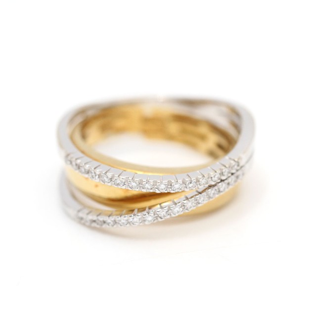 Anillo cruzado de oro bicolor 18k con...
