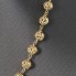 Chapelet de perles ajourées en or 18k d'occasion