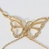 Aiguille papillon d'occasion en or 18 carats avec zirconias