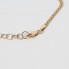 Aiguille papillon d'occasion en or 18 carats avec zirconias