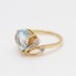 Bague en or 18k avec topaze bleue et diamants seconde main