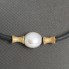 Collier en or 18 carats avec perle et caoutchouc