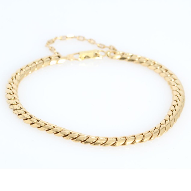 Bracelet gourmette en or 18 carats...