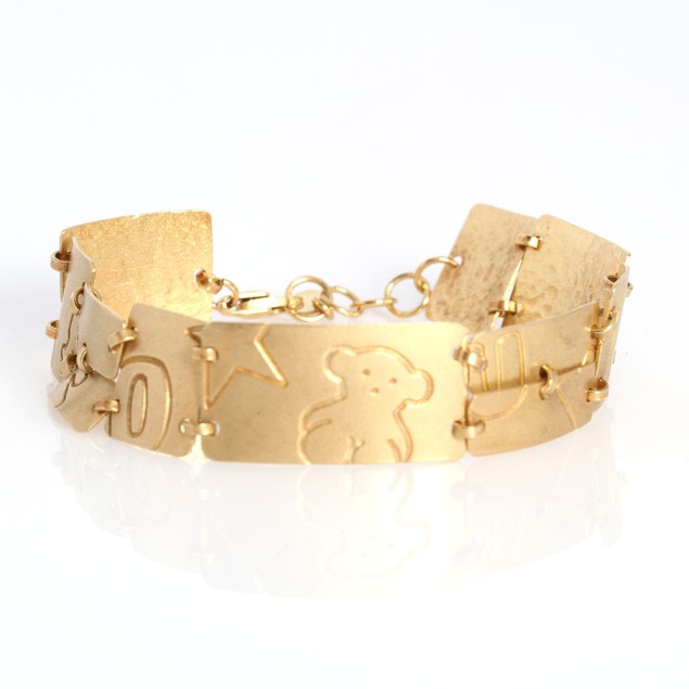 Bracelet TOUS PUZZLE en or 18 carats...