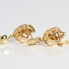 Boucles d'oreilles d'occasion en or 18 carats à motif végétal