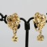 Boucles d'oreilles d'occasion en or 18 carats à motif végétal