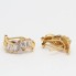 Boucles d'oreilles vagues en or 18 carats avec zircone seconde main