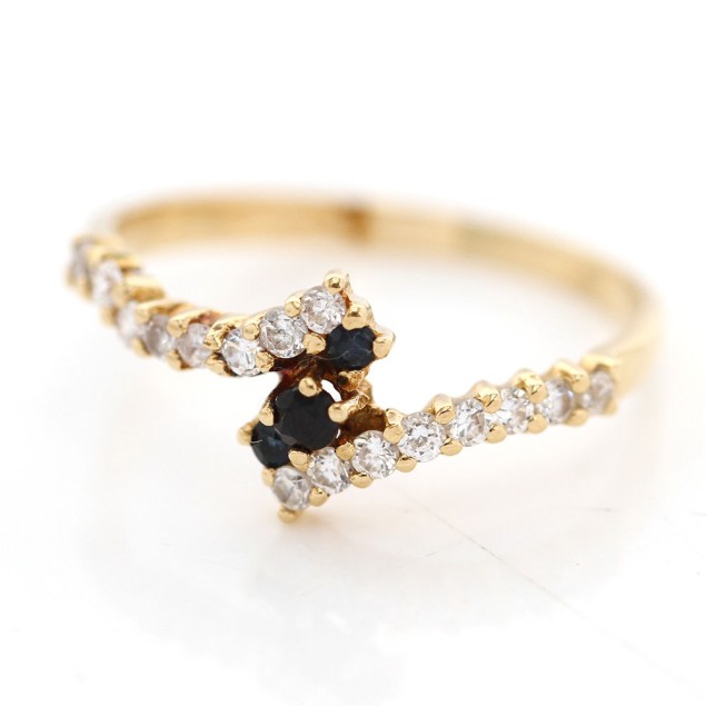Anell creuat d'or 18k amb circonites...