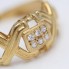 Anillo trenzado de oro 18k con circonitas de segunda mano