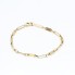 Bracelet alterné en or 18 carats seconde main