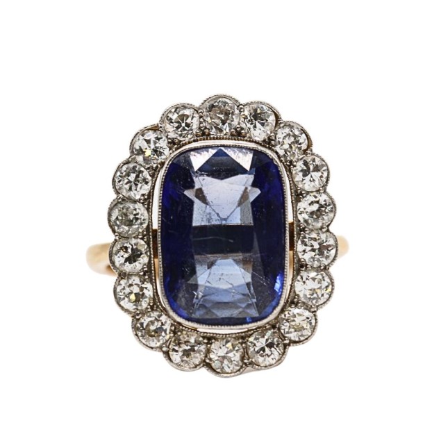 Anillo rosetón oro 18k con zafiro y...