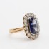 Anillo rosetón oro 18k con zafiro y diamantes segunda mano