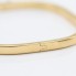 Bracelet carré en or 18 carats trotteuse
