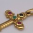 Pendentif CROIX en or jaune et pierres précieuses