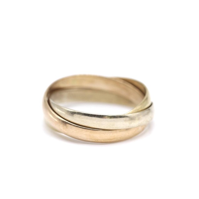 Alianza triple entrelazada de oro 18k...