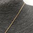 Cordon avec pendentif en forme de cœur en or 18 carats seconde main