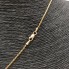 Cordon avec pendentif en forme de cœur en or 18 carats seconde main