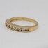 Media alianza de oro 18k con diamantes de segunda mano