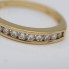 Media alianza de oro 18k con diamantes de segunda mano