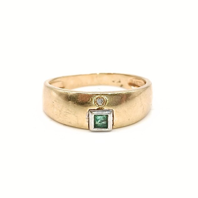 Anillo de oro 18k con diamante y...